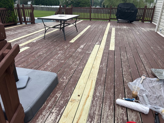 Deck with replacement boards installed